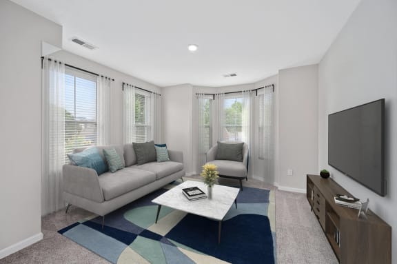 a living room with a couch and a coffee table and a tv at Monmouth Row Apartments, Newport, 41071