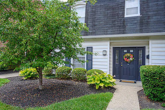a front door of a house with a wreath on it at Olde Towne in Kenwood, Cincinnati, OH