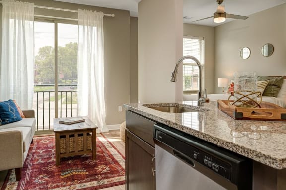 a kitchen with a sink and a counter top at Adelphi Quarter, Columbus