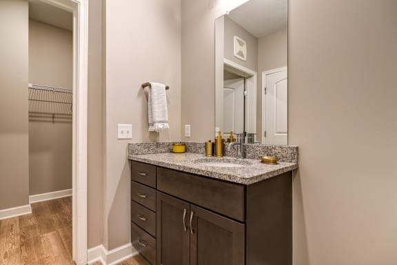 a bathroom with a vanity and a large mirror at Adelphi Quarter, Ohio, 43203