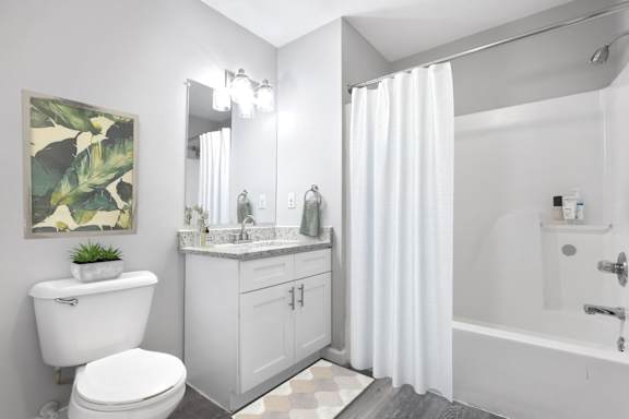 a white bathroom with a white toilet and a shower at Parkview of Lebanon Apartments, Lebanon, 41042