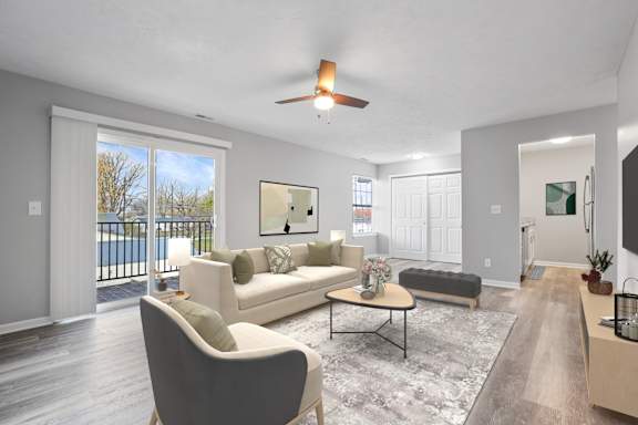 a living room with a couch and a table at Parkview of Lebanon Apartments, Lebanon, Indiana