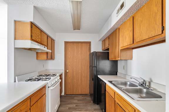 Kitchen with Wooden Cabinets at Providence Glen Apartments, Columbus, 43219