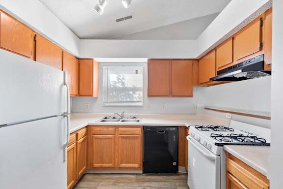 Kitchen with Wooden Cabinets at Providence Glen Apartments, Ohio, 43219