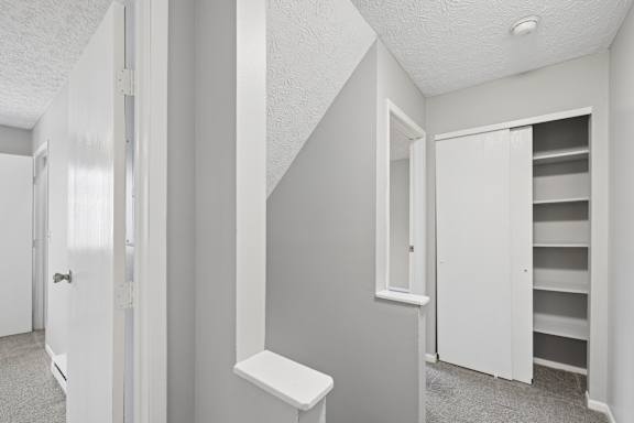white door is open to a hallway at Timbercreek Apts, Ohio