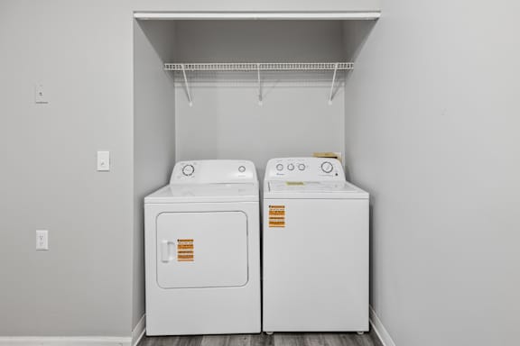 Two white washing machines at Timbercreek Apts, Columbus