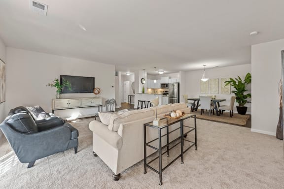 a living room with a couch and a table