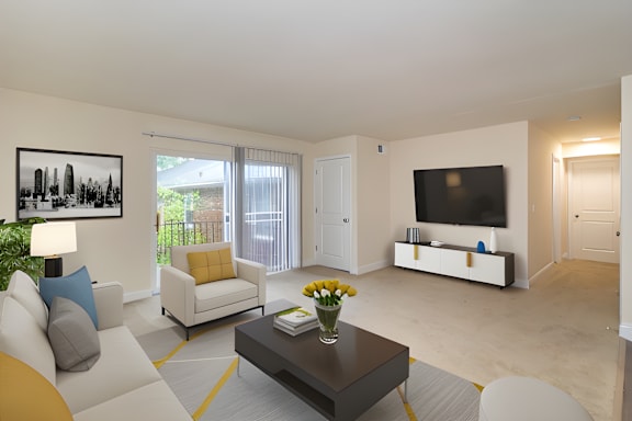 a living room with a couch and a coffee table and a television at Olde Towne in Kenwood, Ohio, 45243