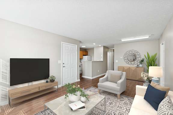 A living room TV and a white sofa at Waterfront Pointe, Indiana
