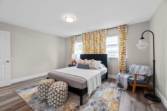 Bedroom with a nightstand at The Rand Apartments, Columbus, 43227