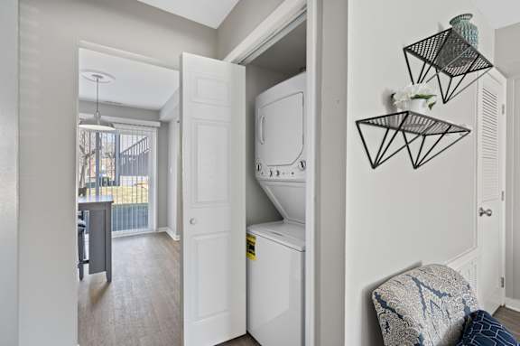 A small laundry room with a washer and dryer. at The Parkton, Cincinnati, OH