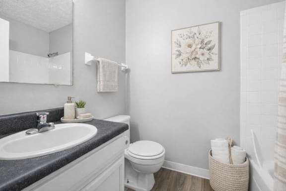 bathroom with basket of towels at Timbercreek Apts, Columbus