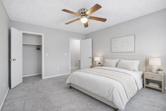 White bed in large bedroom at Timbercreek Apts, Columbus, OH