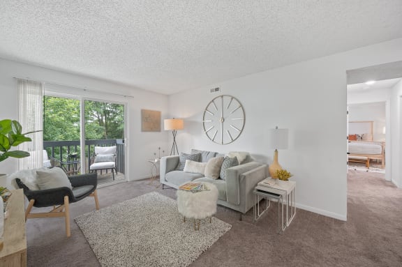 a living room with a couch and a chair
