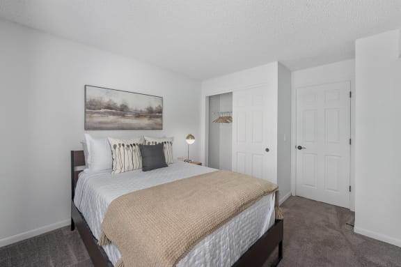 the preserve at ballantyne commons bedroom with bed and closet