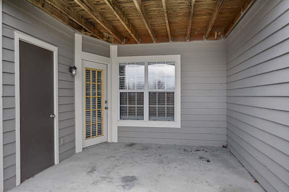 A room with a door and a window at Indian Lookout Apartments, West Carrollton, OH