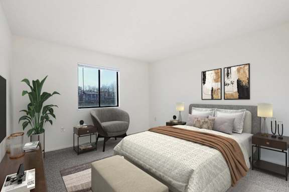 A bedroom with a large bed and a chair.