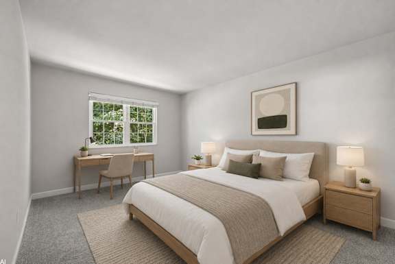 A bedroom with a large bed and a desk with a chair.