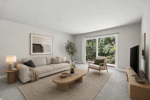 A living room with a couch, a chair, a coffee table, and a television.