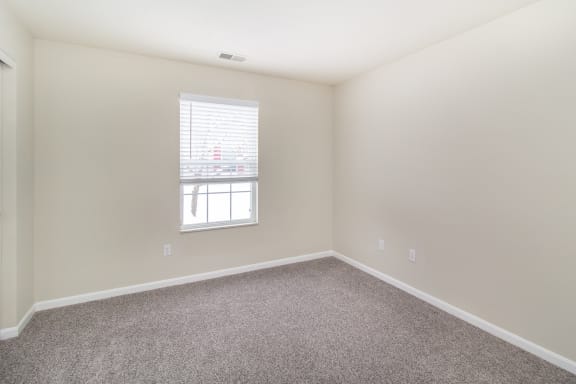 Room with carpet and a window