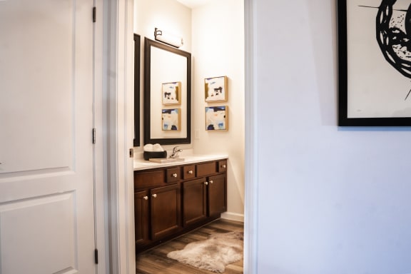 the view of a bathroom with a sink and a mirror at Waterstone Landing, Ohio