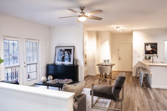 a living room with a ceiling fan and a dining room and a kitchen at Waterstone Landing, Ohio, 43551