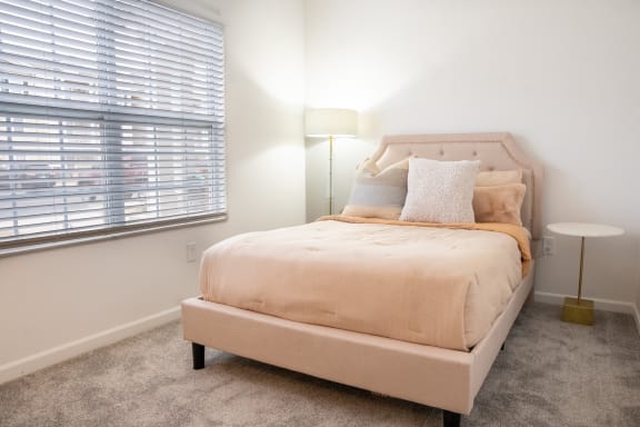 a bedroom with a bed and a window at Waterstone Landing, Ohio, 43551