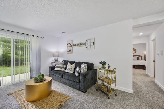 Living room with a couch and a table