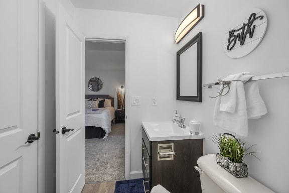 Small bathroom with a sink and a mirror