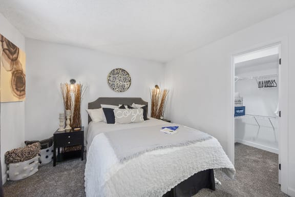 Bedroom with a bed and a closet