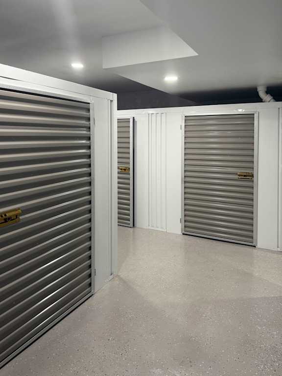 A storage facility with closed grey doors at Rose Hill Apartments, Alexandria, VA