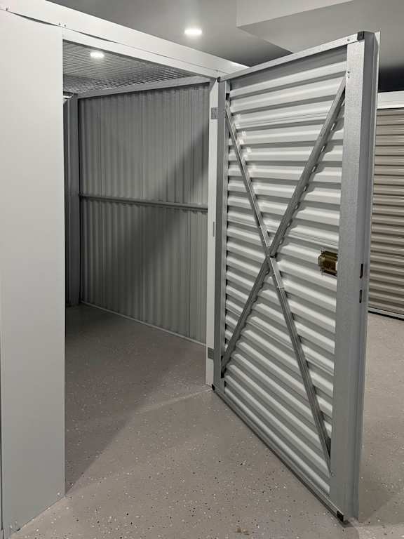 A metal gate with a lock is closed at Rose Hill Apartments, Alexandria, 22310