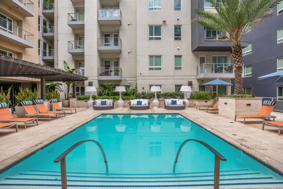Resort-Style Swimming Pool with Sundeck Cabanas at South Park by Windsor, Los Angeles, California
