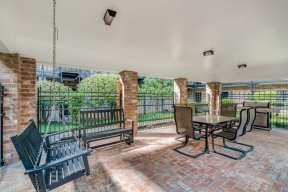 Outdoor Gathering Space with BBQ Grills at Allen House Apartments, 77019, Texas