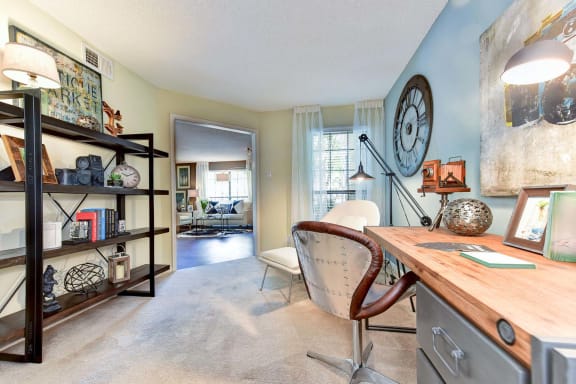 Windsor Oak Creek - Den or home office with a large clock on the wall in Fairfax VA