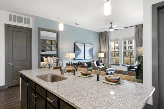 Kitchen with dining area at Windsor Lakeyard District, an apartment community in North Dallas