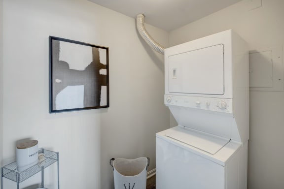 Laundry room with a washer and dryer at Windsor Kingstowne in Alexandria VA