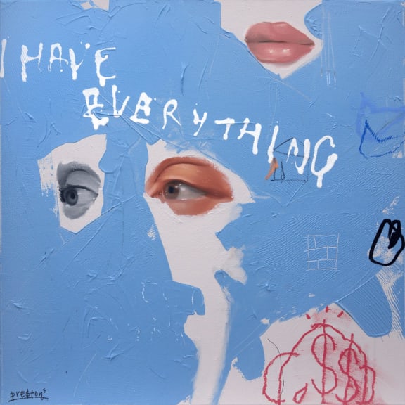 a piece of street art with the words i have everything written on it