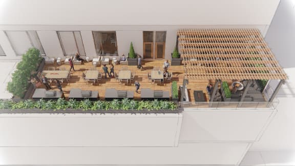 Elevated Outdoor Living Space with Multiple Grills and Dining Area at Waterside Place by Windsor, 505 Congress St, Boston