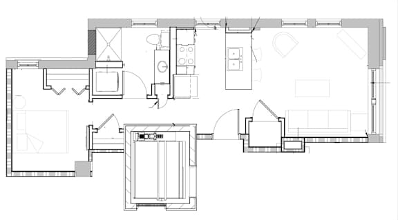 A floor plan of a house with a kitchen, living room, and bathroom.