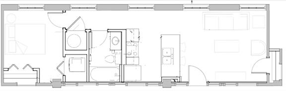 A floor plan of a house with a kitchen, living room, and two bedrooms.