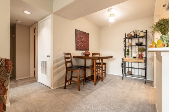 View of the dining area in a one-bedroom model unit at The Lakes.
