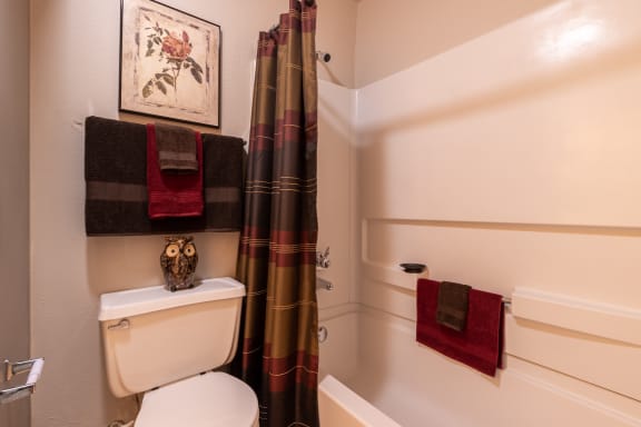 Bathtub in the bathroom of a one-bedroom townhome model unit at The Lakes.
