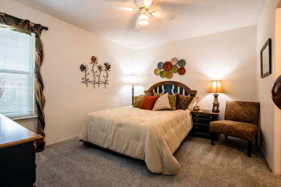 View of the main bedroom in a two-bedroom model unit at The Lakes.