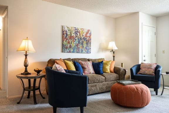 Spacious living room in a two-bedroom model unit at The Lakes.