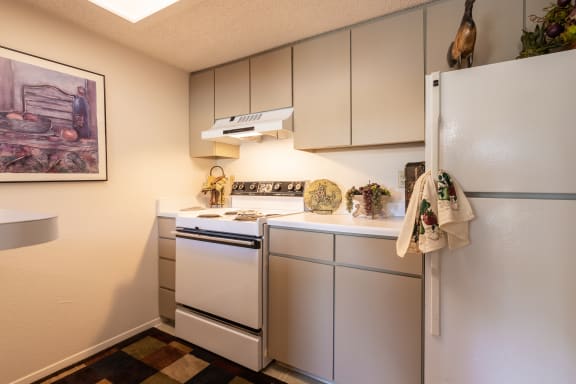 Kitchen in a one-bedroom townhome model unit at The Lakes.