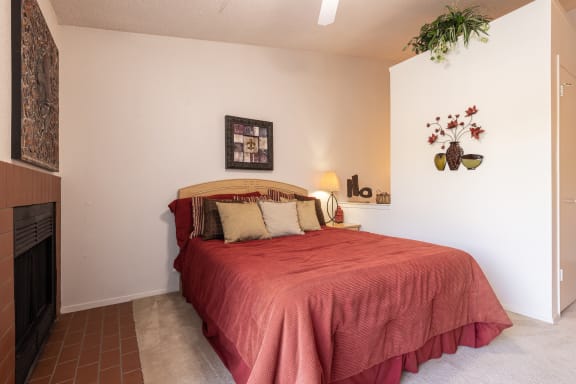 View from the bedroom of a one-bedroom townhome model unit at The Lakes, overlooking the open staircase.