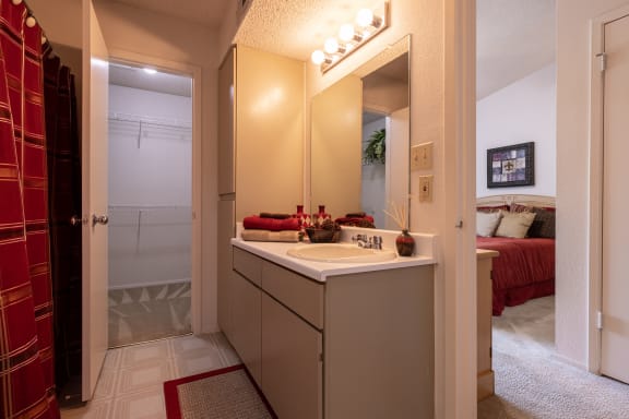 View of the bathroom sink in a one-bedroom townhome model unit at The Lakes.