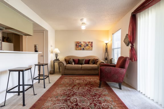 Living room interior of a one-bedroom townhome model unit at The Lakes.