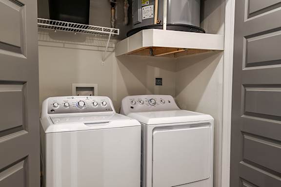 a washer and dryer in a laundry room